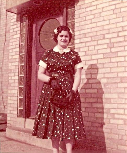 Nora Barbalace outside the Ladies' Entrance, 1950s