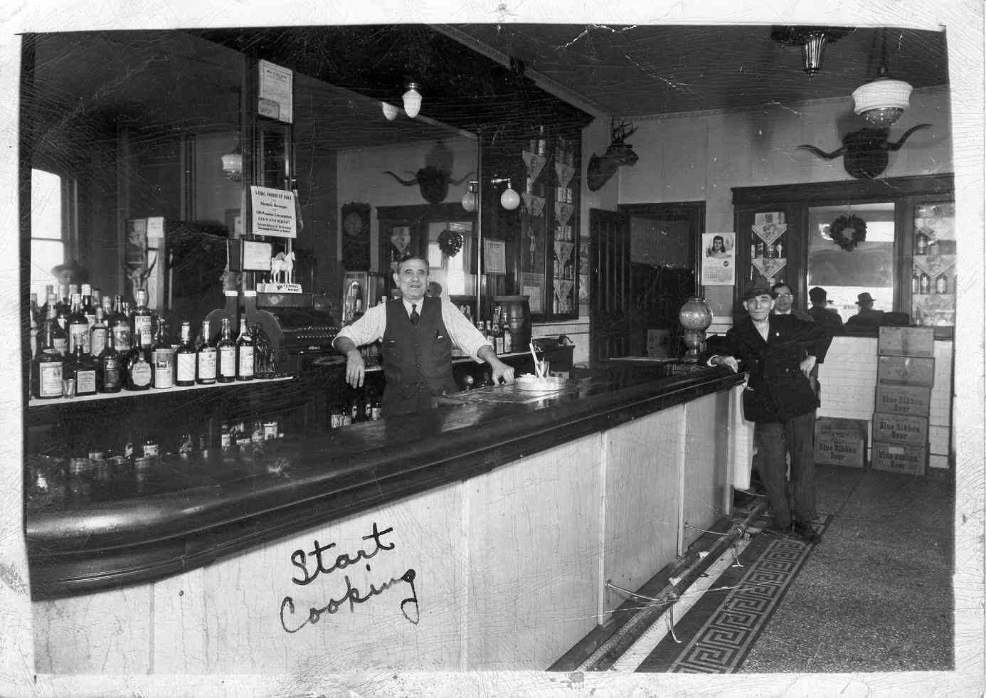 Giacinto Sciamanna behind the bar, February 1944