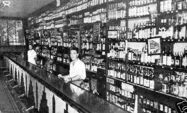 U-Need-A Cafe interior, 1940s postcard showing the long bar