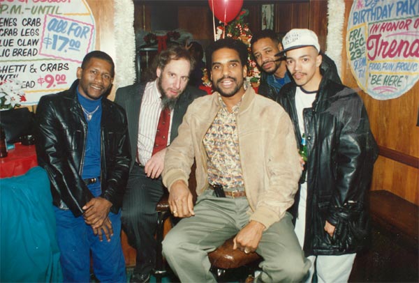 Mike, Phil Casden, Jim Gaines and guests at birthday party, Krystal Lounge, December 11, 1996