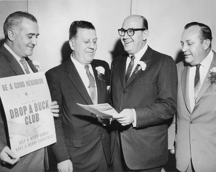 Tony Patragnoni taking part in Courier-Post sports editor Frank Ryan's 'Drop A Buck Club' which aided needy families at Christmas