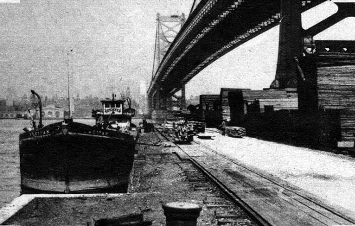 Discharging a barge load of North Carolina boards, David Baird Company, 1926