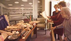 Three generations of Rohrer women at the library reading room