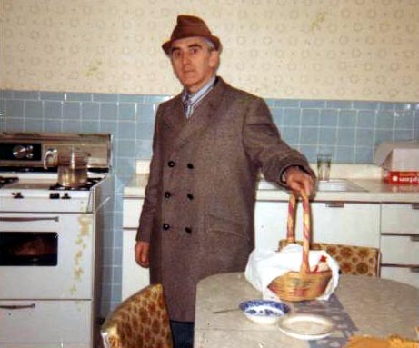 Casimir Alexander Brodowicz returning from church with Easter food blessing, 1049 Mechanic Street, Camden NJ, 1970 or 1971