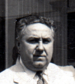 Dominick Lorusso outside his barber shop at 1640 Broadway