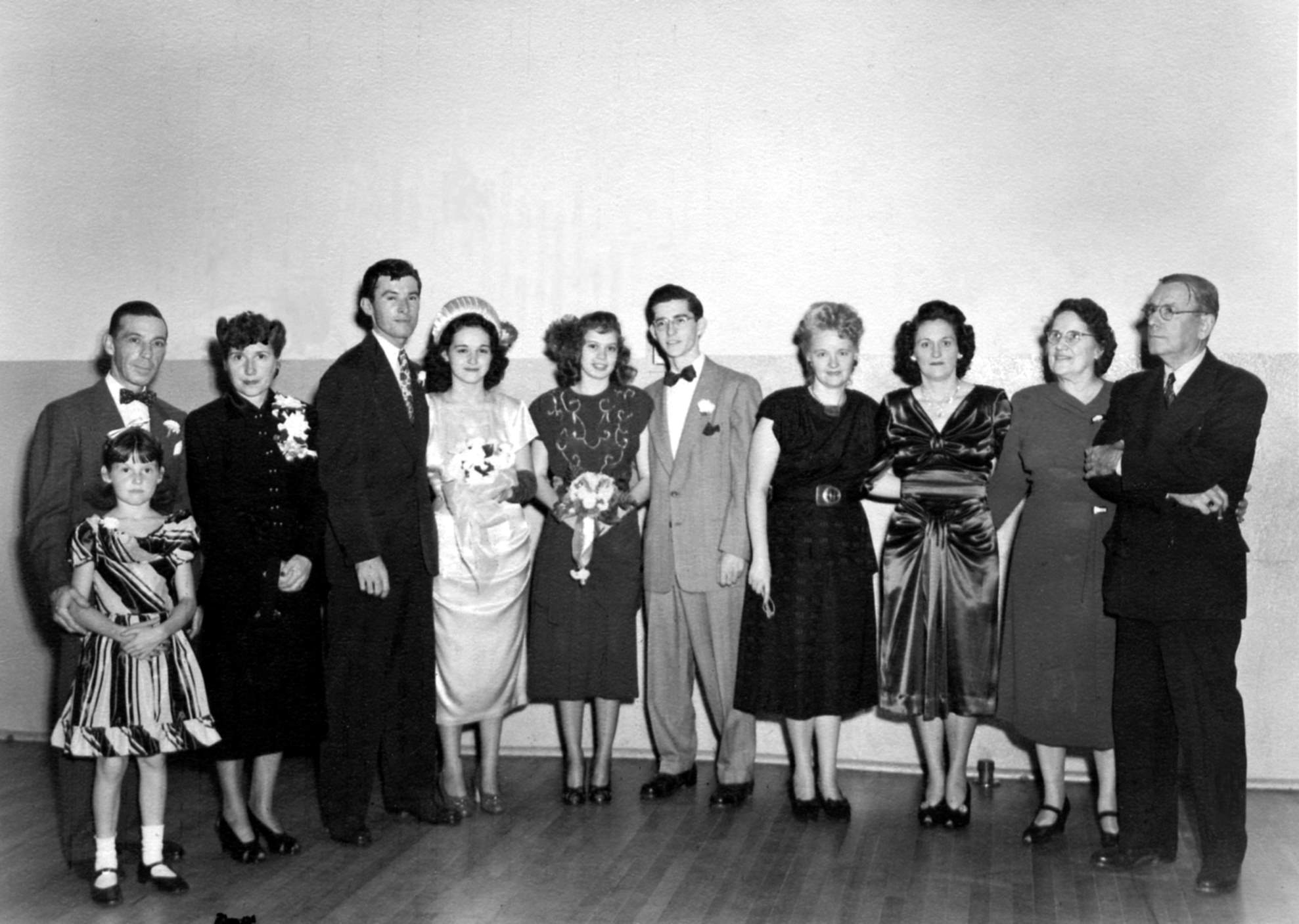 Wedding reception — William R. Kelly, Doreen Kelly, Eva Mae Kelly, Milton W. Kelly, Jane Engel Kelly, Virginia Brennan, Louis G. Engel Jr., Catherine McKenna, Mildred McKenna, Eva E. Roles, William J. Roles