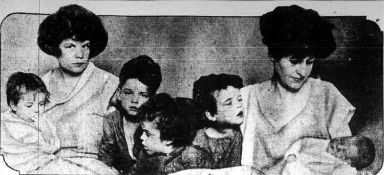 Six of the ten living children of Mr. and Mrs. Louis Okeson of 766 Division Street with their mother