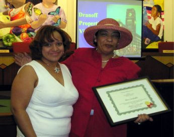 Beatrice Caraballo receives award from Sandra Houghton at the 3rd Annual Walt Whitman Preservation Forum, spring 2004