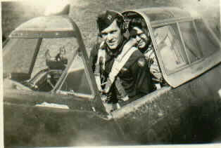 Captain John R. White in the cockpit of a P-47 Thunderbolt, late 1944 - early 1945