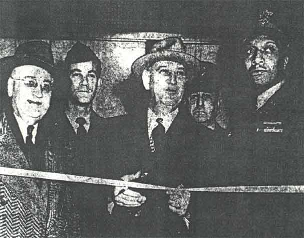 Opening ceremony of the new Midway Theater, January 1951, with Mayor Brunner cutting the ribbon