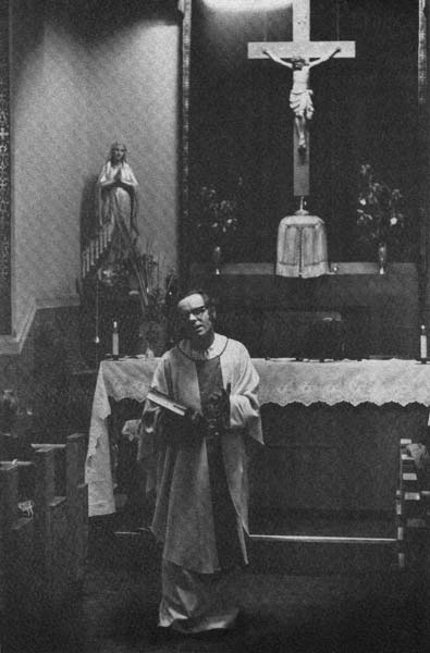 Father Michael Doyle at St. George Roman Catholic Church, Camden, 1970s