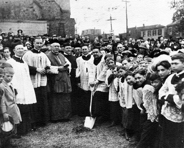 Fr. John B. McCloskey and Monsignor Bernard J. Mulligan lead groundbreaking for Sacred Heart School, May 11, 1919