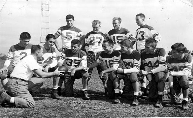 Camden Catholic High School football team at Pyne Point Park practice field, 1956 — Coach Hank Deighan
