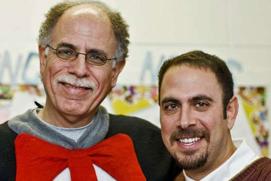 Principal Malcolm Adler with his son Brian on his last day at George Washington Elementary School, December 23, 2008