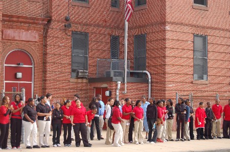 9/11 ceremony at Met East High School (former Lincoln School) — Note the sign over the door that once read 'Lincoln School', 2007