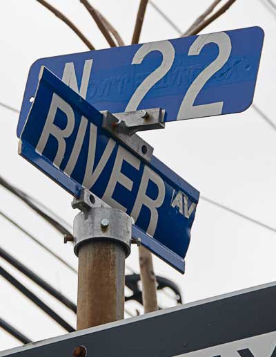 Street sign at North 22nd Street & River Avenue