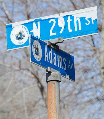 Street sign at the intersection of North 29th Street and Adams Avenue