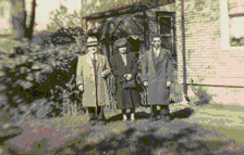 James David, Annie, & Leslie Willmott in backyard, early 1950s