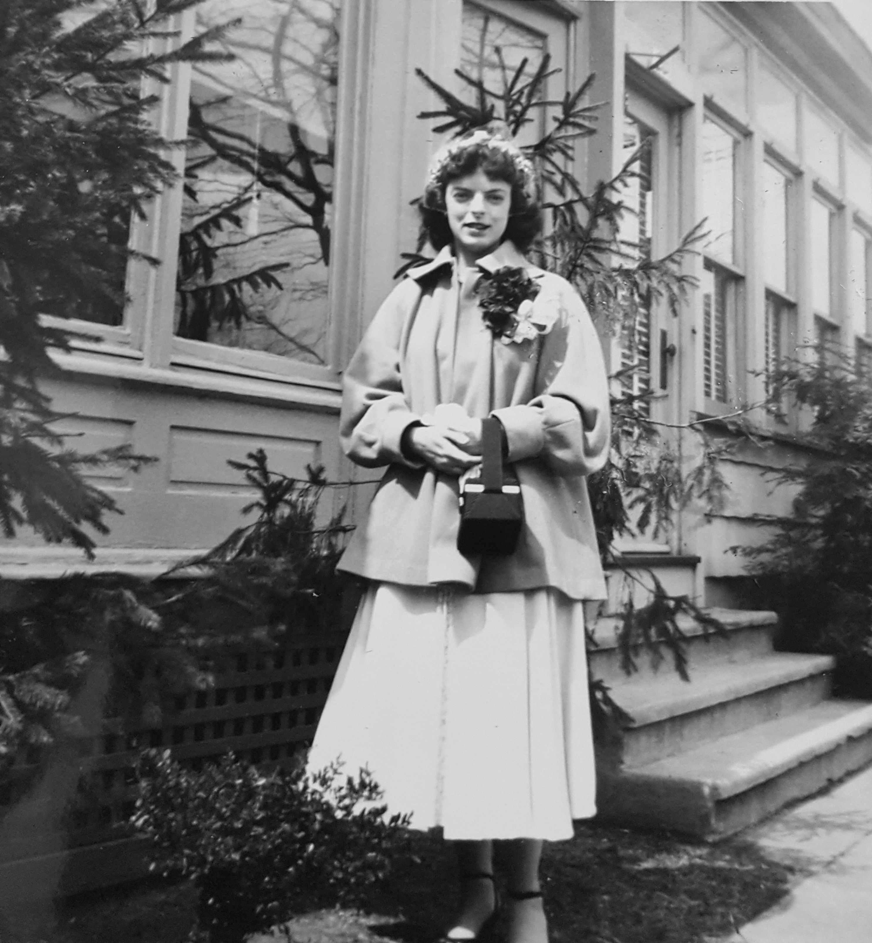 Kaye Corzine standing in front of 203 South 35th Street, 1953
