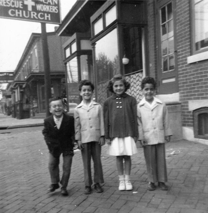 Frank DeNinno, Ronald Venella, Lorraine DeNinno, and Anthony R. Venella in front of 1134 South 3rd Street, about 1947