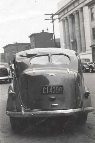 Wrecked automobiles outside Cooperson Bros., Fourth Street
