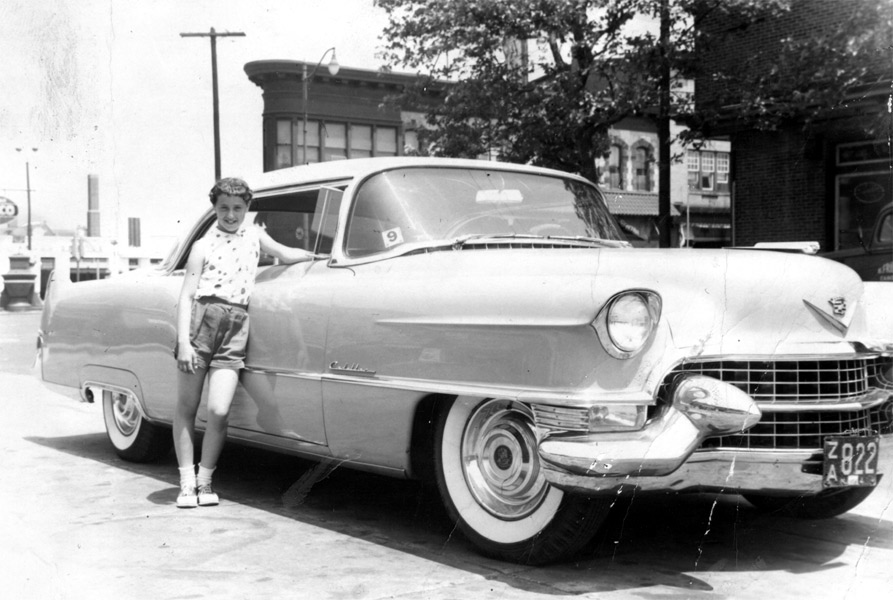 Girl beside a Cadillac, 1211 South Fourth Street