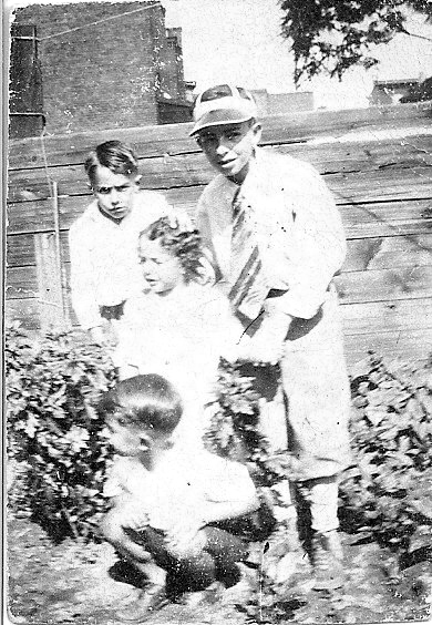 The Petrillo Brothers of 216 Benson Street, Camden NJ — Tony kneeling, Gus with curls, Frank in back, and Jimmie Petrillo standing, about 1930
