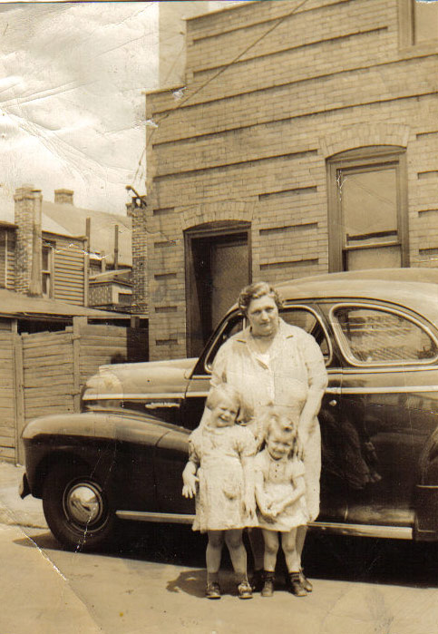 Jennie Long Werner with Anna Werner Miller and Evelyn Werner Camp in front of Werner Moving and Storage on Berkley Street in 1941