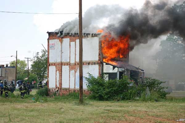 The last house on Borton Street, 528 Borton Street, engulfed in flames, June 1, 2008