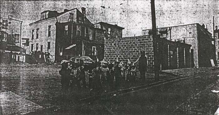 Children from El Centro day care center crossing the vacant lot at 123-127 Danenhower Street, Camden Courier-Post, November 1, 1973