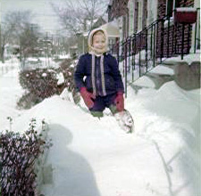 Cynthia Schreiner on the front patio of 164 Dudley Street, around 1960