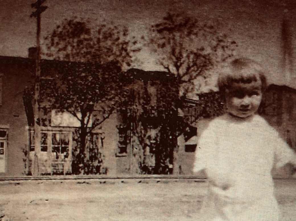 Robert Bradel, circa 1919, in front of 316 Elm Street