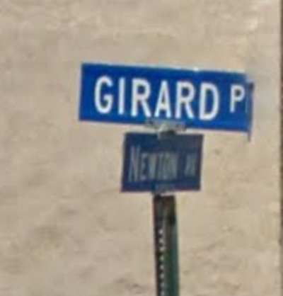 Street sign at intersection of St. John Street and Newton Avenue, 2012