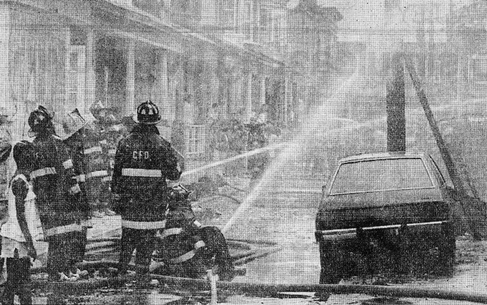 Camden firefighters douse flames as neighbors gather in the 700 block of Grant Street