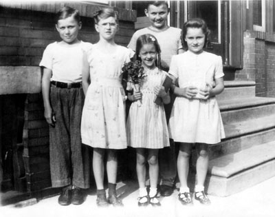 Fairess family in front of 918 Kimber Street, about June 1950