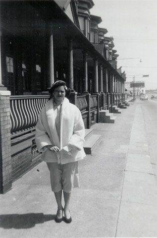 Barbara Stone in front of 931 Linden Street, April 1955