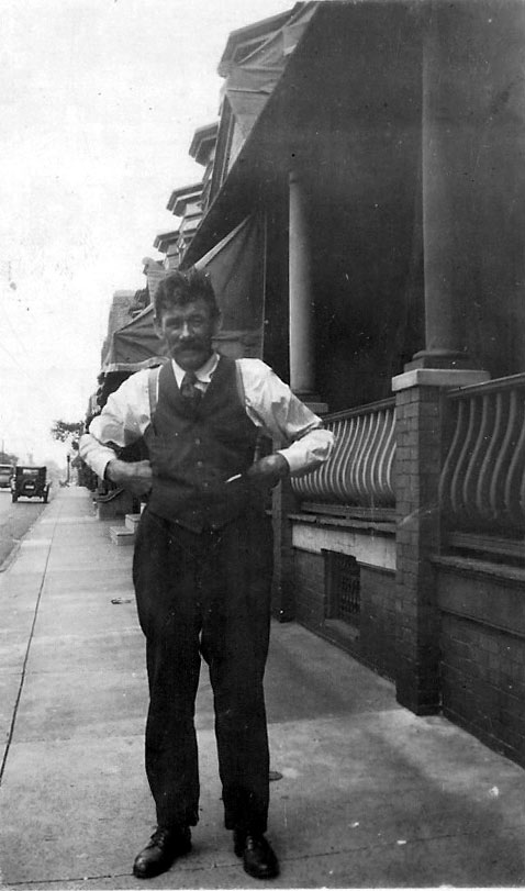 Harry McDaniel in front of 937 Linden Street, 1932