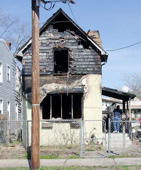 1114 Lois Avenue, damaged by fire, photograph taken March 13, 2012