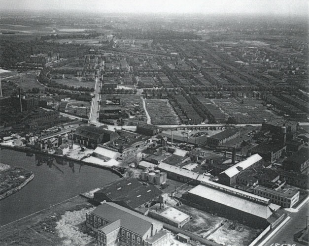 1929 aerial image looking southeast along Magnolia Avenue — Mechling Brothers chemical factory in foreground, Camden High at upper left