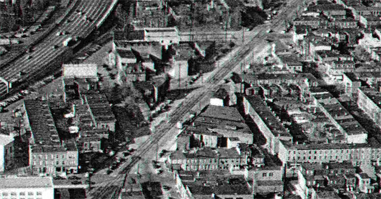 1952 aerial view of Main Street between 4th and 6th Streets, showing railroad tracks still in place