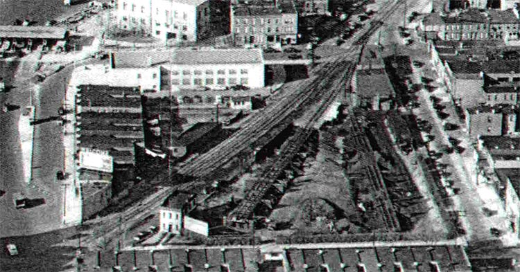 1952 aerial view of the 600 Block of Main Street, showing the R.M. McAllister coal yard