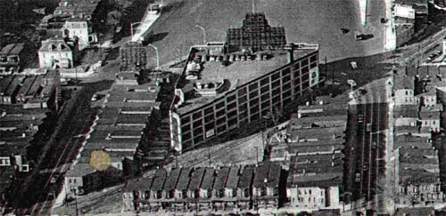 1952 aerial view of the 700 Block of Main Street, showing the Bridge Plaza Parking Garage