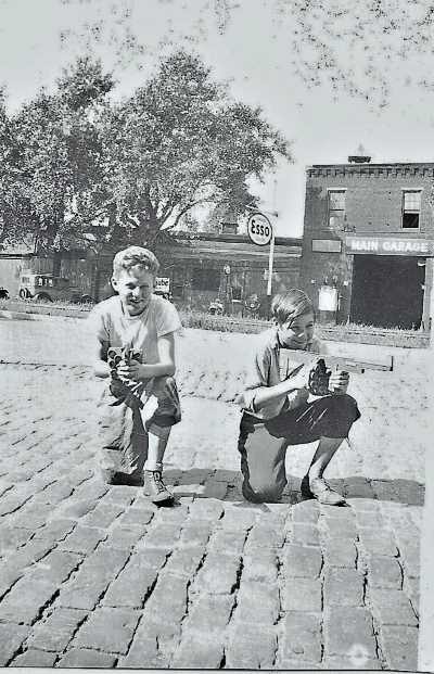 323 Main Street, Main Garage, 1930s-1960s. Dave Schneider and Ted Jones, circa 1935.