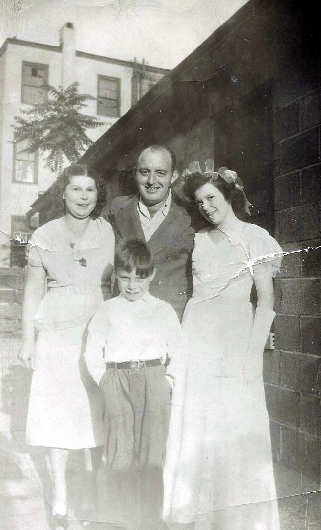 Robert R. Rowan Sr. with wife Rose, daughter Rita Rose, and son Ronald Roy