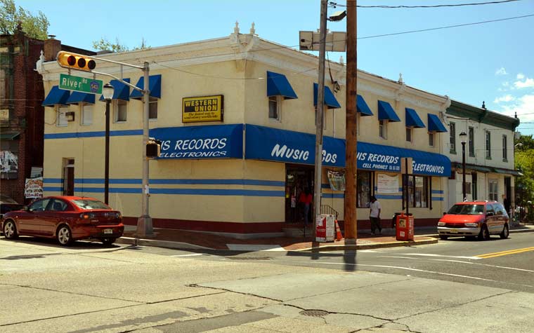 Southeast corner of River Avenue and Cambridge Avenue, seen from northwest corner of North 27th Street and River Avenue, August 22, 2011