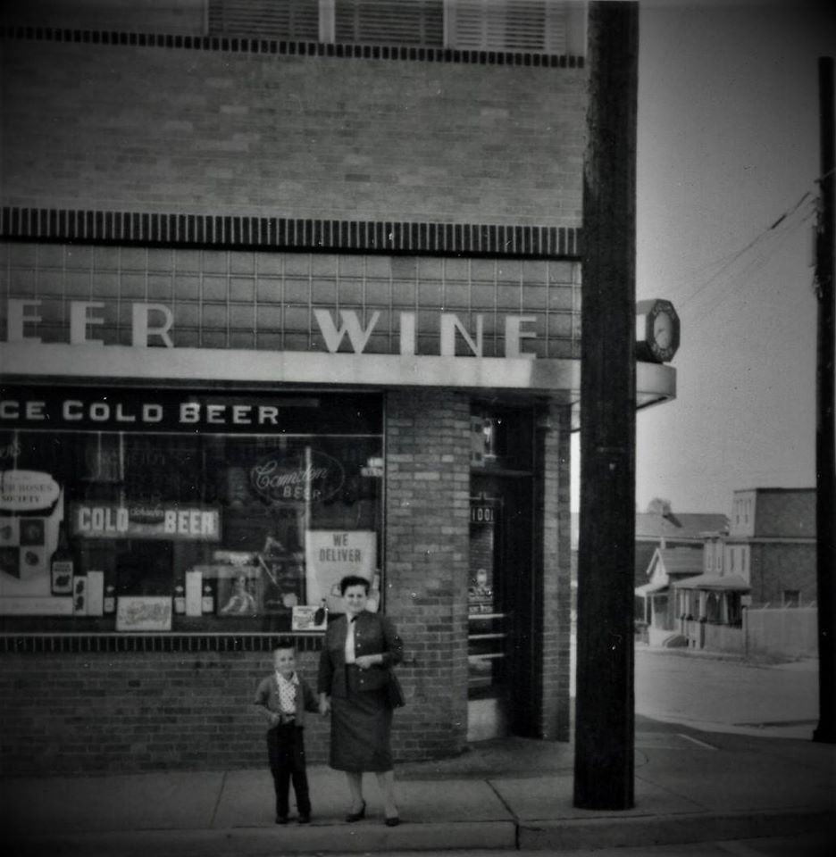 Casey Urban and his mom at Crescent Beverage, 1959