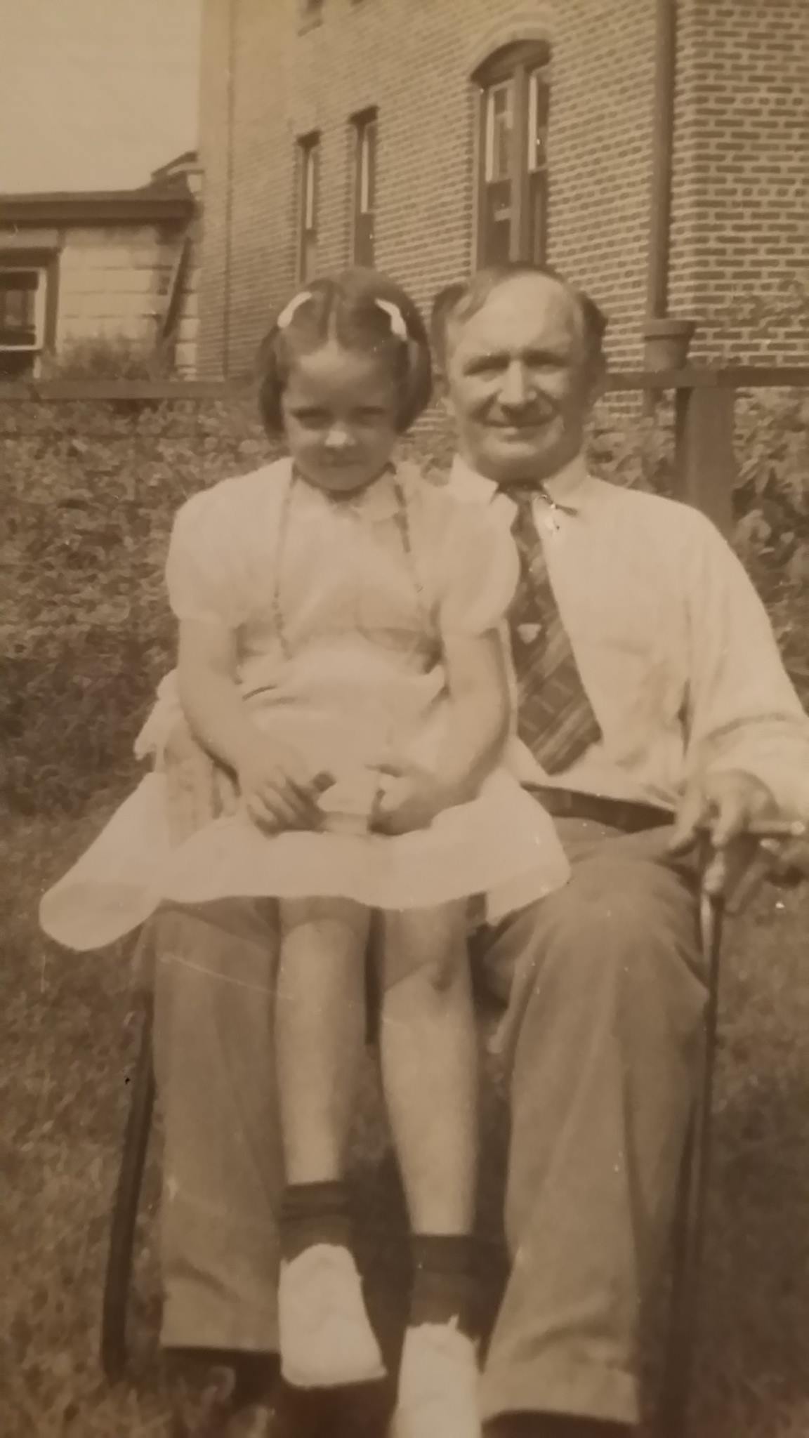 George E. Hoover with his daughter Elaine in the rear of the bar at 3209 River Avenue, 1940-1943