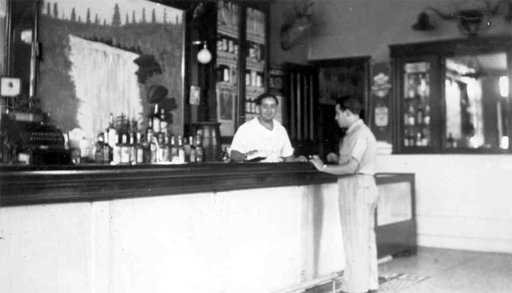 Dante 'Danny' Sciamanna behind the bar, 1939