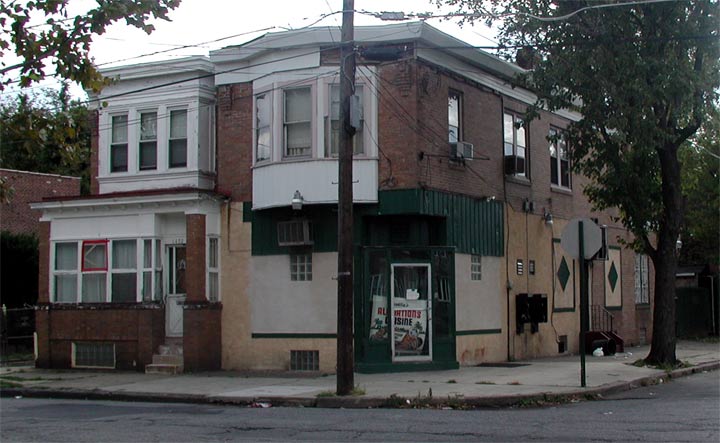 Southeast corner of Sheridan and Pershing streets showing All Nations Lounge (1400 Sheridan Street), 2003