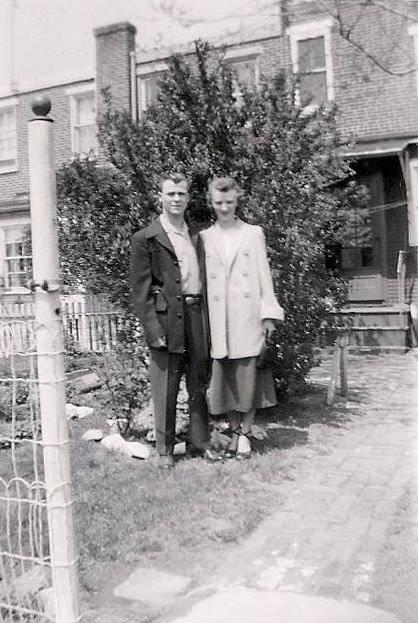 Mr. and Mrs. Frank C. Adams in the back yard of 1336 Whitman Avenue, 1950